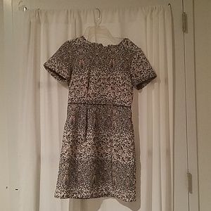 White dress with navy and pink accents